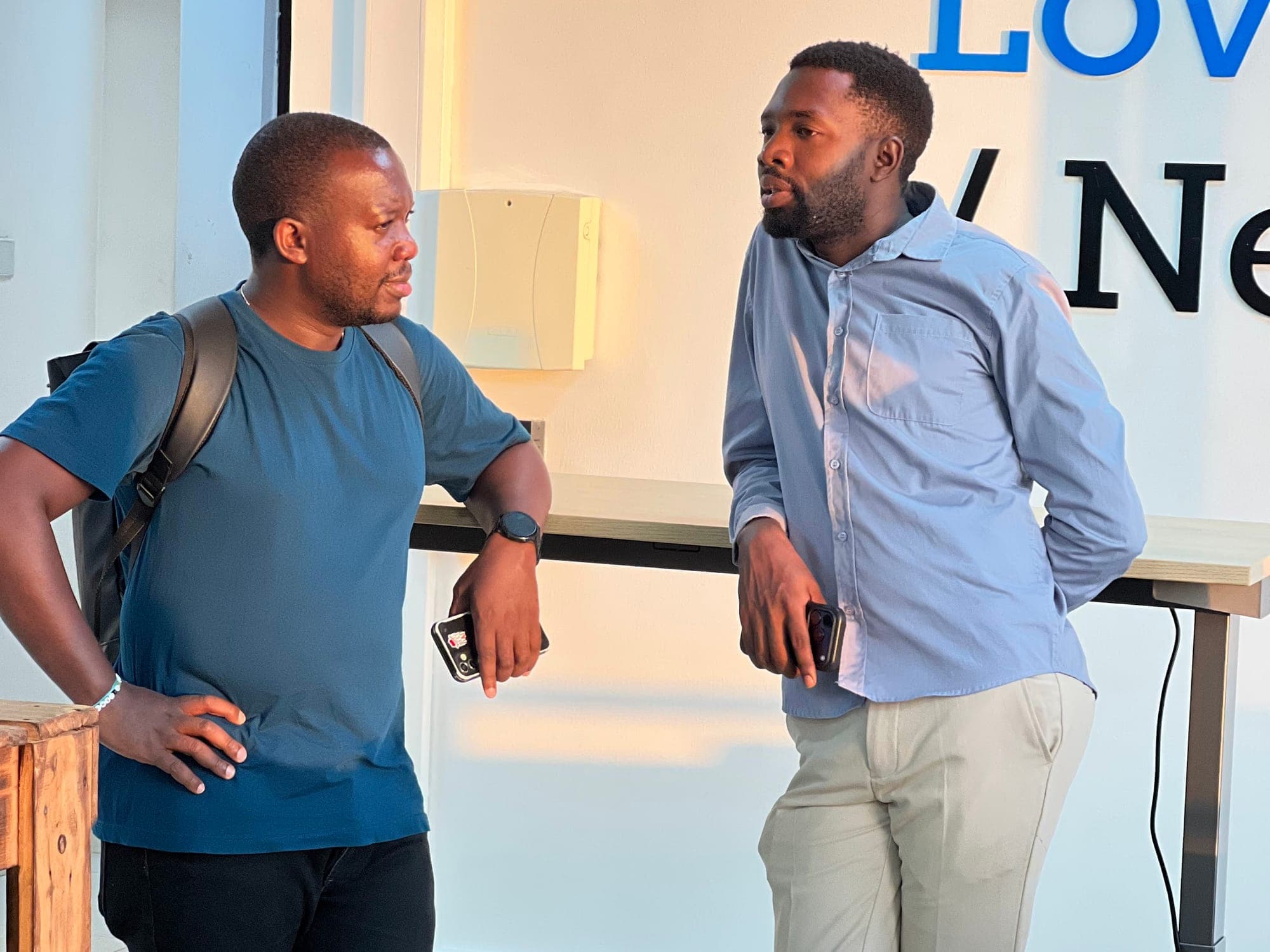 Two members chatting at Africa's Talking
